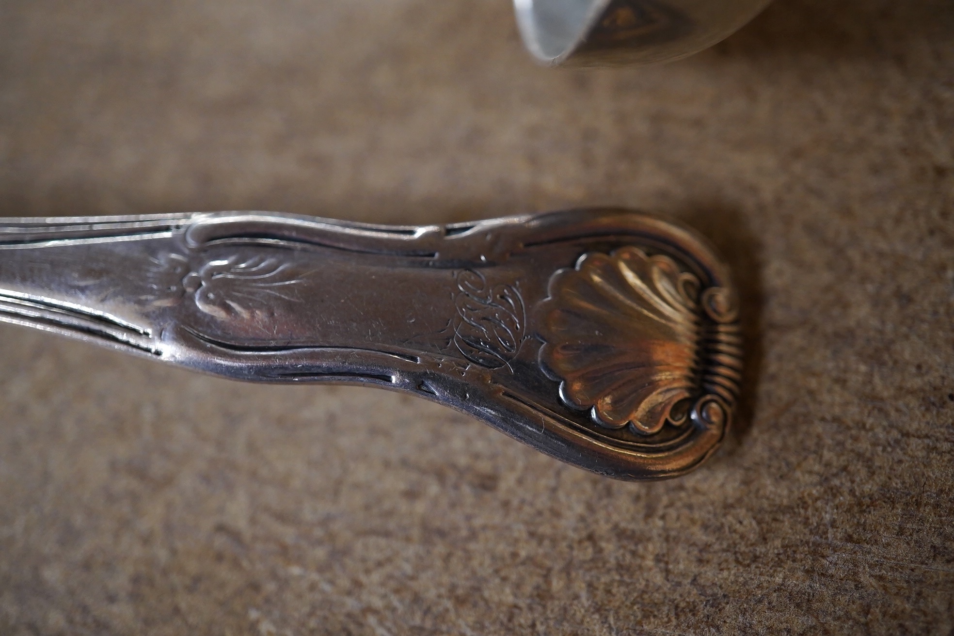 A pair of William IV Scottish silver King's pattern toddy ladles, James & William Marshall, Edinburgh, 1830, 14.2cm, 71 grams. Condition - poor to fair